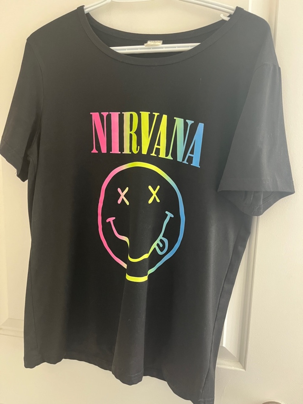 NIRVANA Black Tee with Pink, Yellow & Blue Gradient Logo